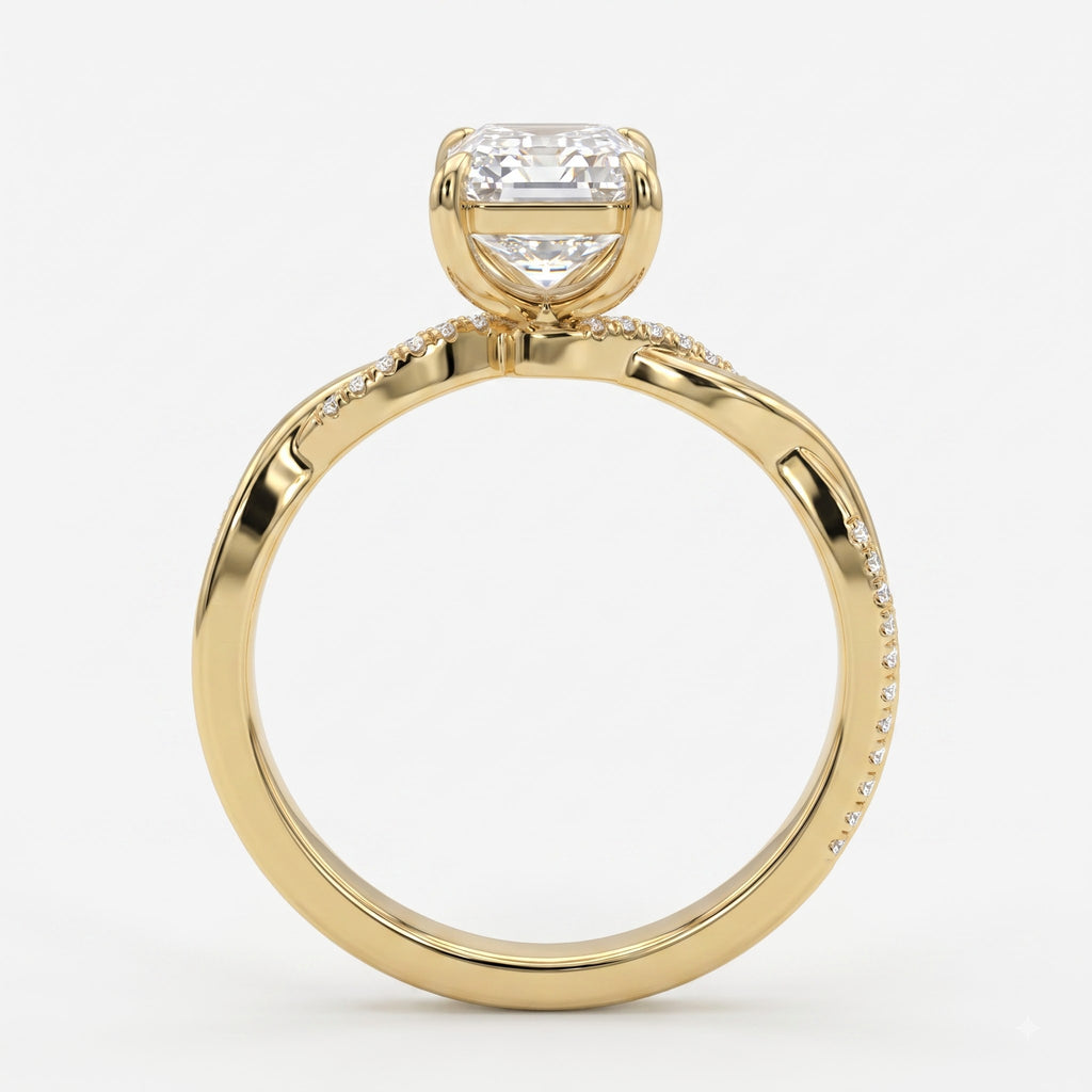 The Lumière Emerald Cut Diamond Twisted Pavé Side Stone Ring