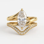 Elegant Marquise cut Diamond V-Shaped Pavé Side Stone Ring