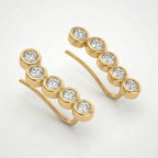 Side profile of yellow gold diamond ear climber earrings with polished bezel settings and curved hook
