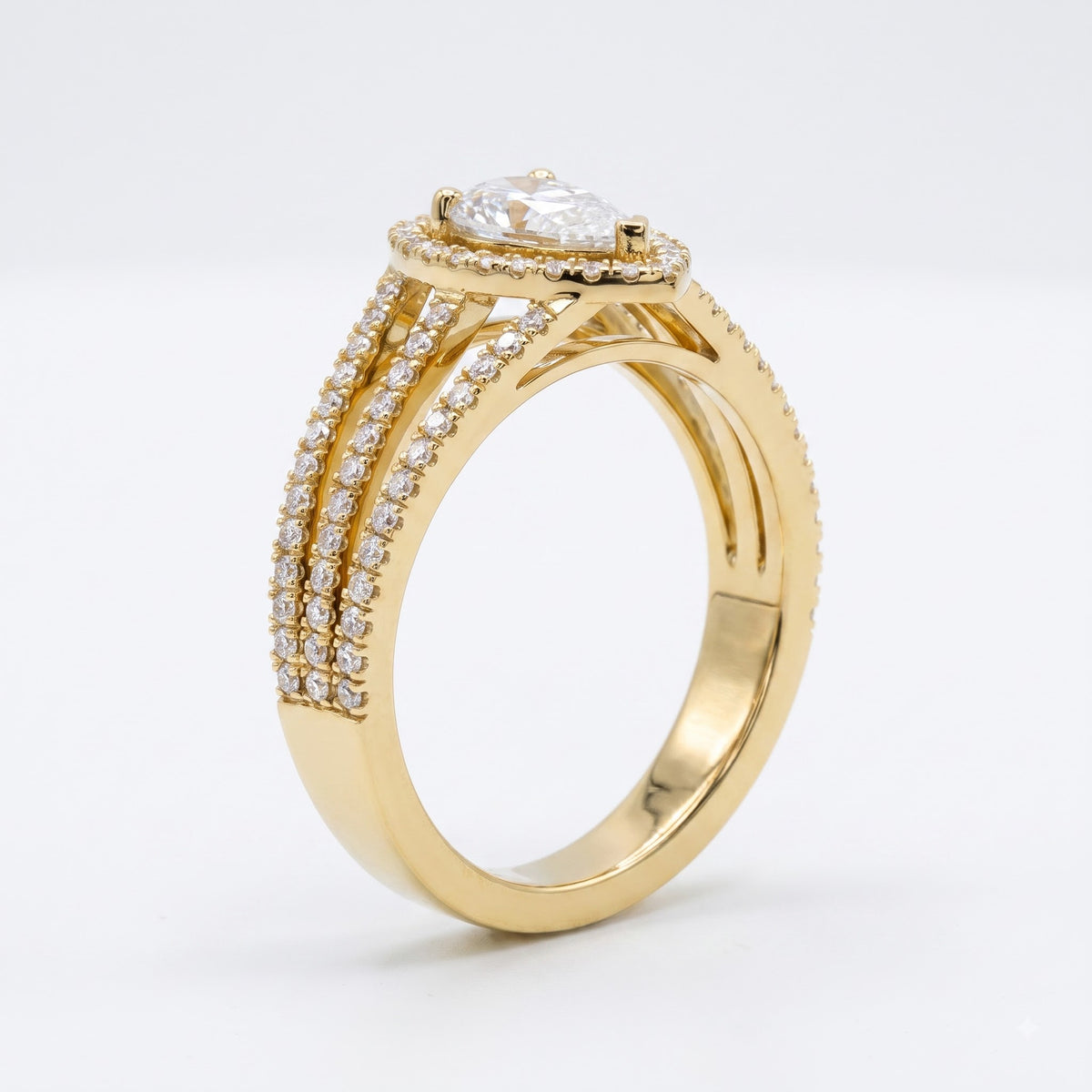 Élan Pear Diamond Sculptural Side Stone Ring