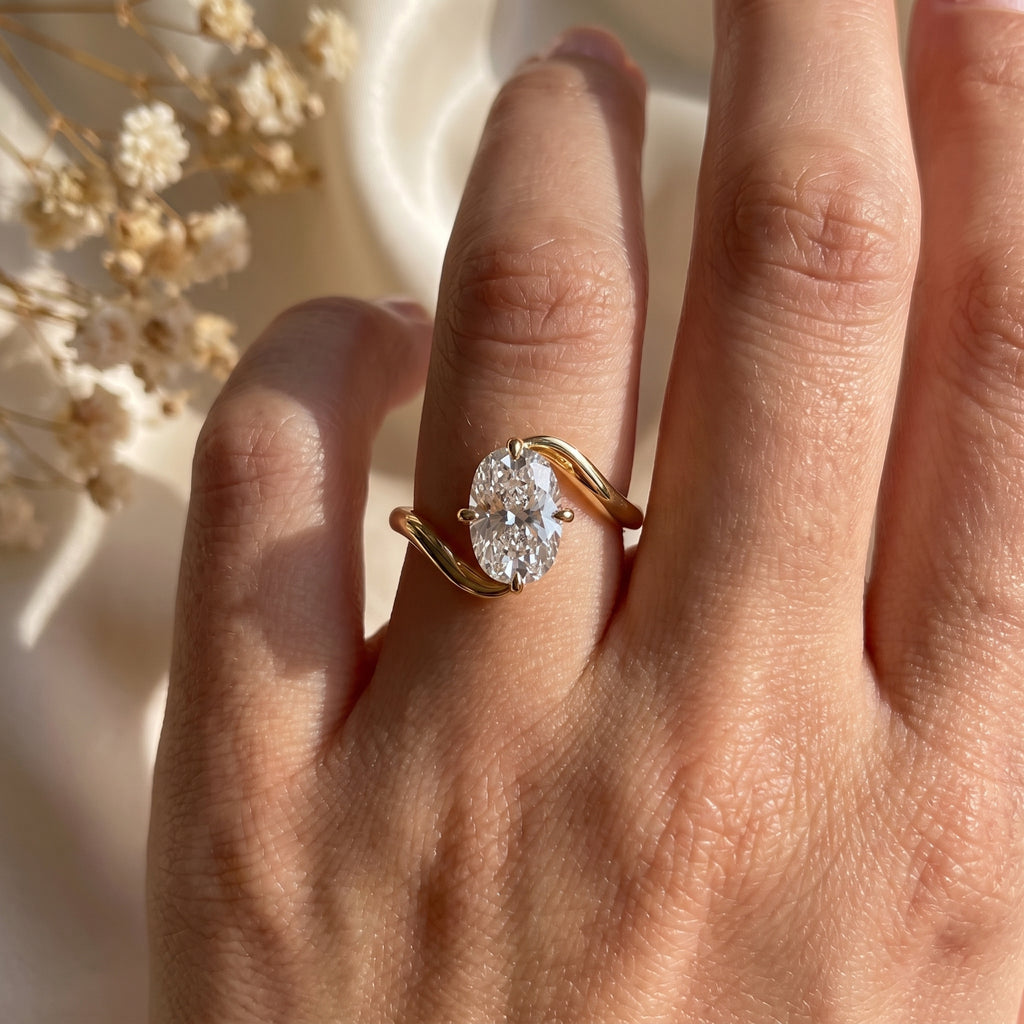 Modern Twist Elongated cushion cut diamond Solitaire ring
