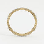Side profile of diamond eternity band showing yellow gold setting details and brilliant diamond placement