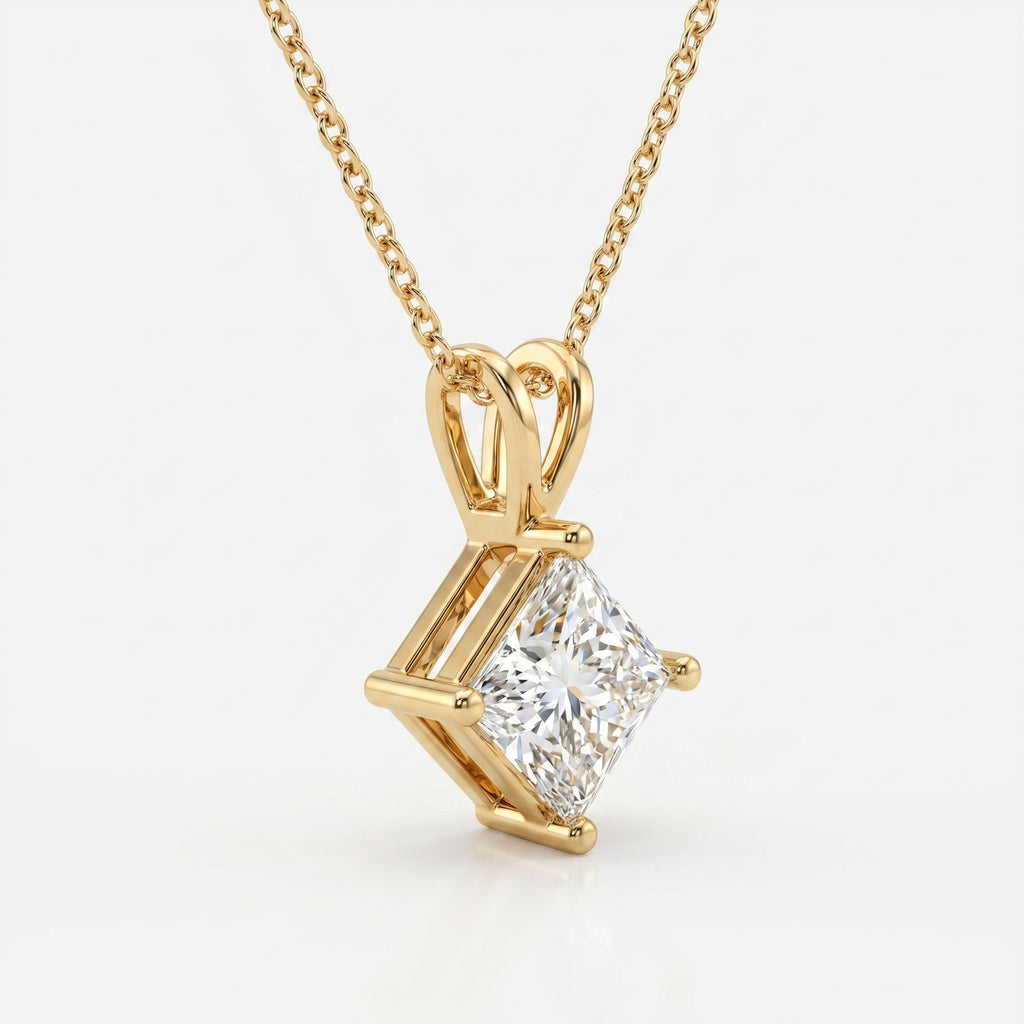 Gold necklace with a diamond pendant on a white background