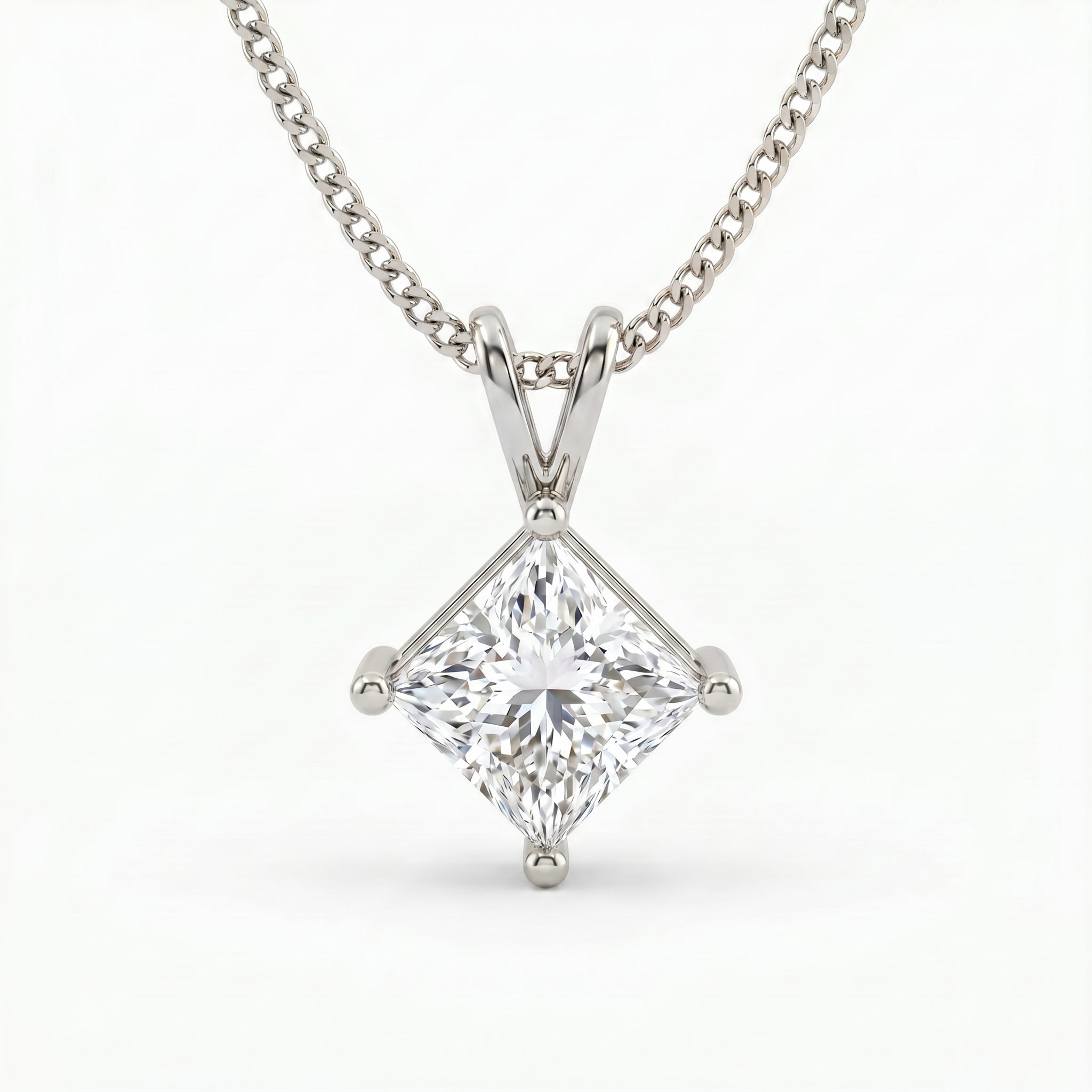 Diamond pendant necklace on a white background