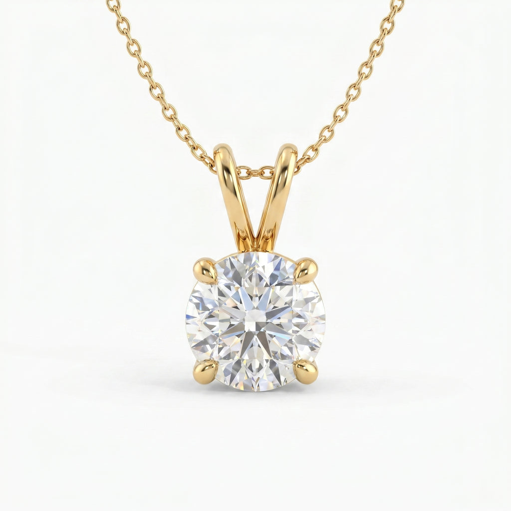 Gold necklace with a round diamond pendant on a white background