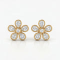 Luxury yellow gold flower diamond stud earrings with bezel-set pear and round cut diamonds on white background