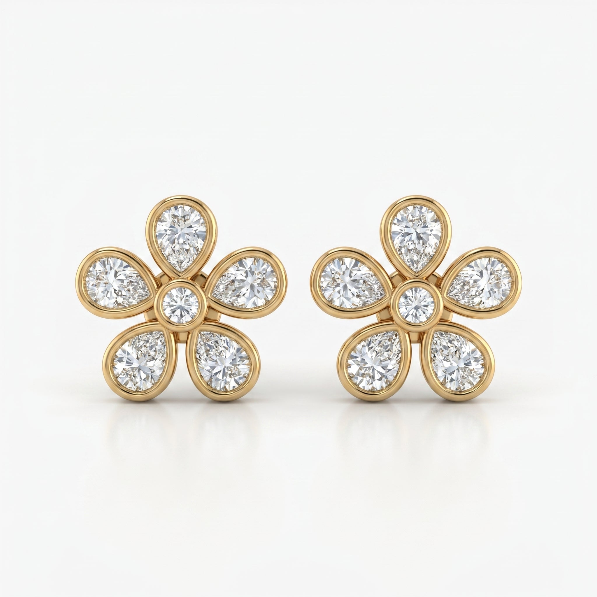 Luxury yellow gold flower diamond stud earrings with bezel-set pear and round cut diamonds on white background