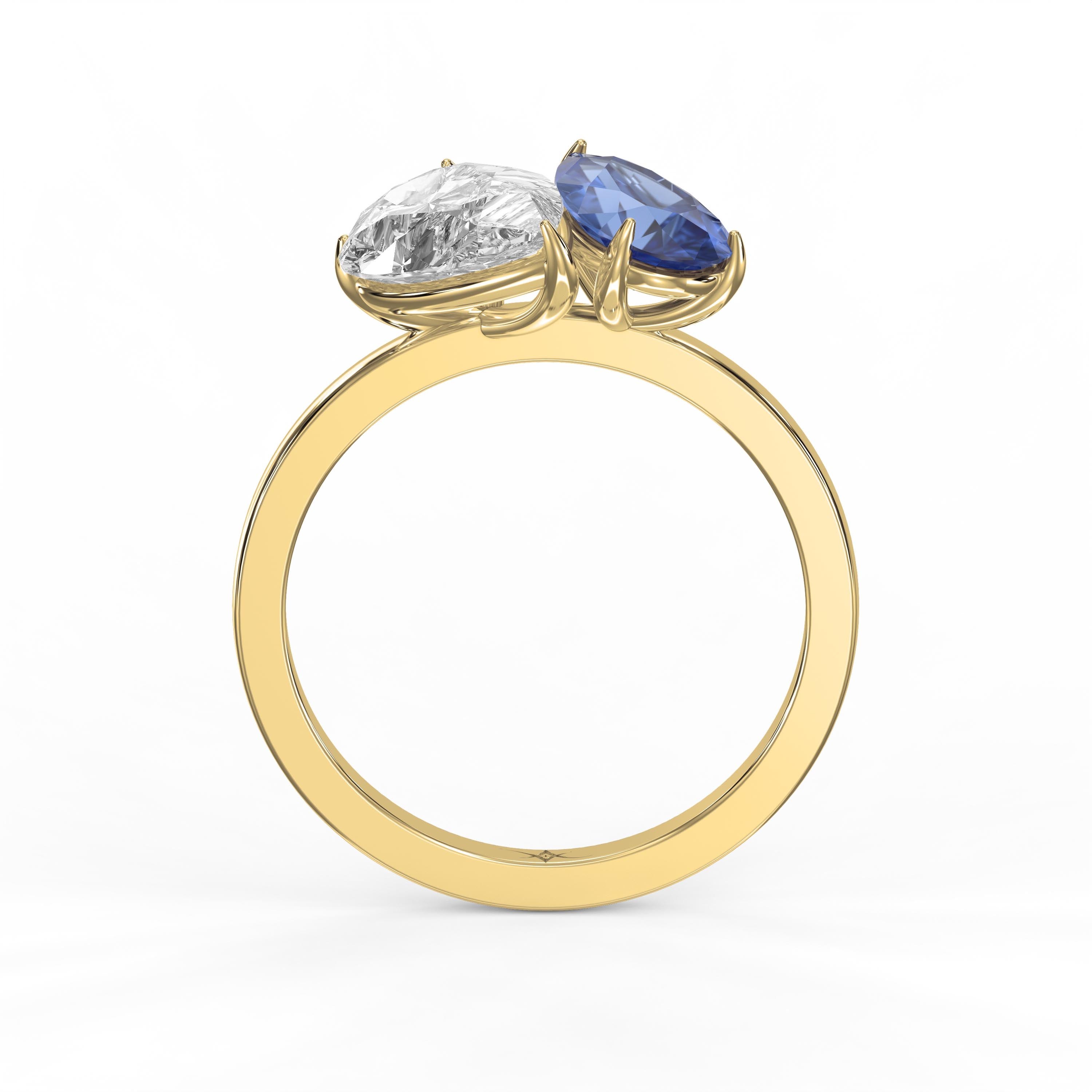 Luxury Toi et Moi Ring with Blue Sapphire and Pear Shape Diamond