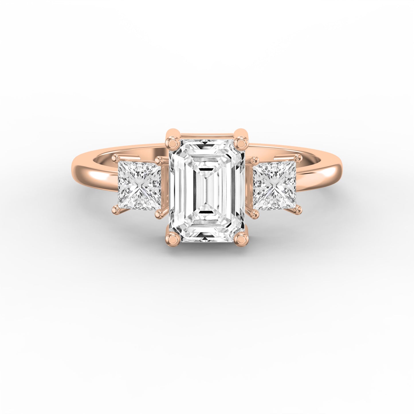 The Axis Trio Emerald Ring