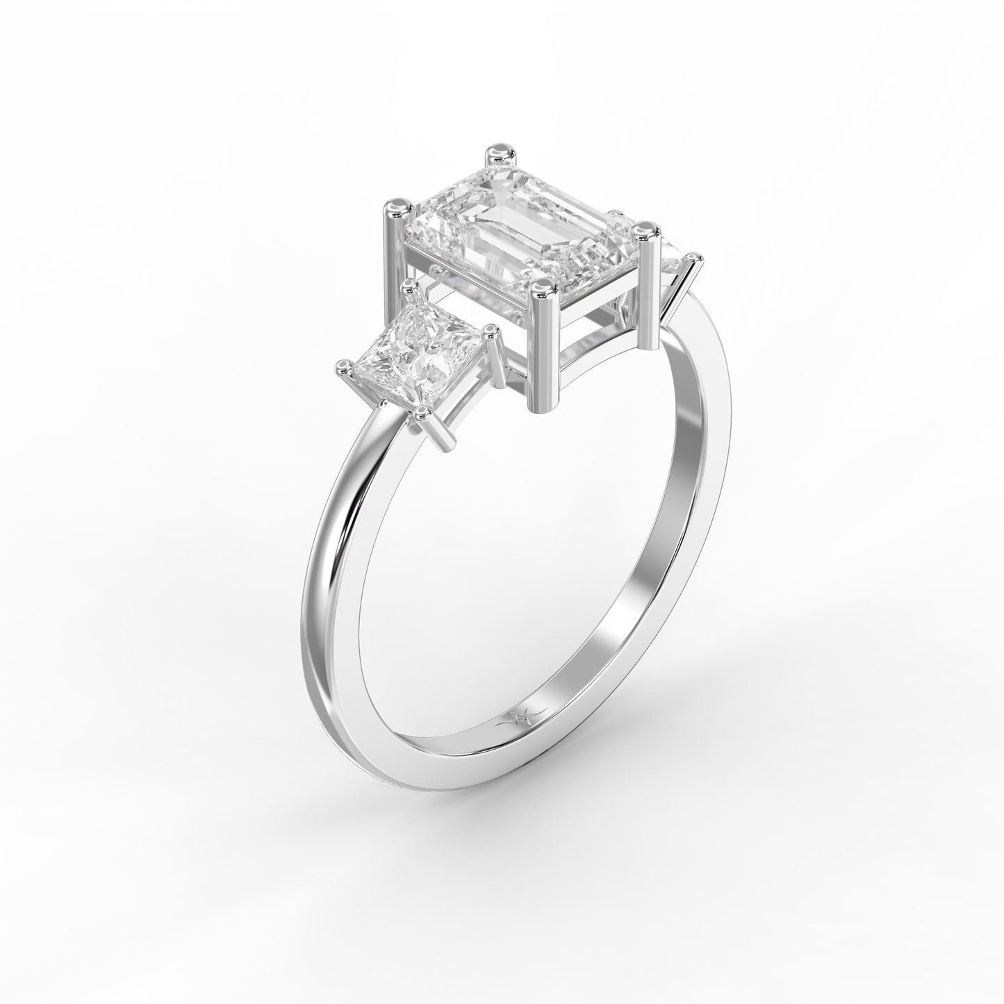 The Axis Trio Emerald Ring