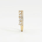 Side profile of yellow gold diamond wedding band showing elevated settings and detailed craftsmanship