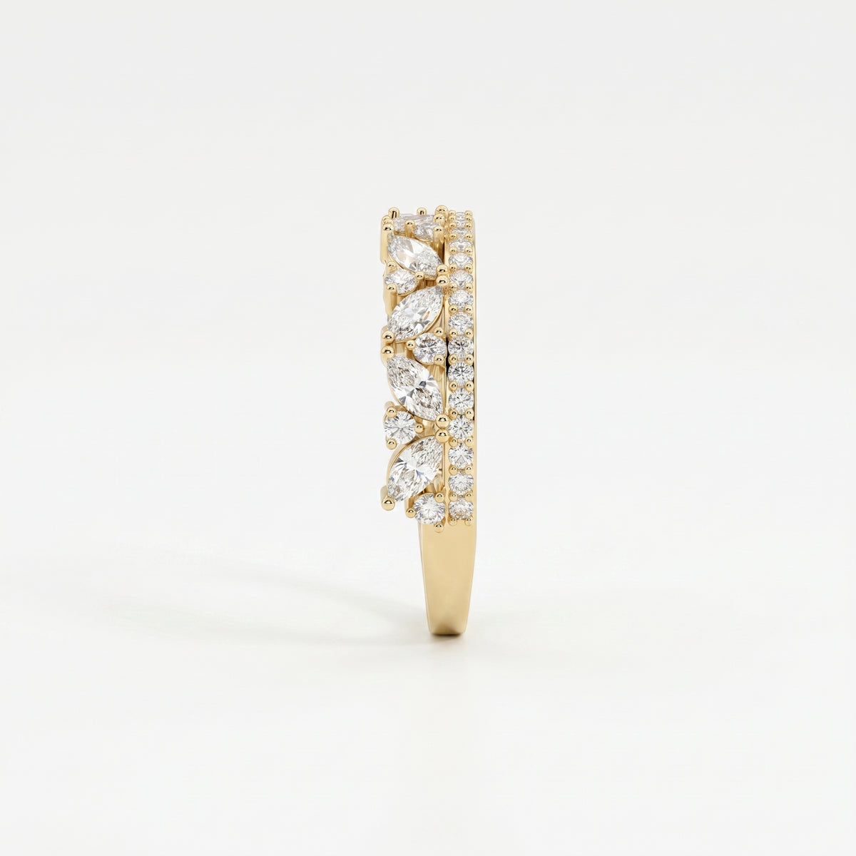 Side profile of yellow gold diamond wedding band showing elevated settings and detailed craftsmanship