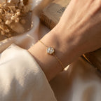 Close-up of adjustable clasp and delicate chain detail on minimalist crystal bracelet in rose gold
