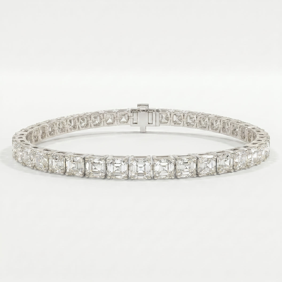 Top view flat lay of asscher cut diamond tennis bracelet with elegant continuous gemstone design