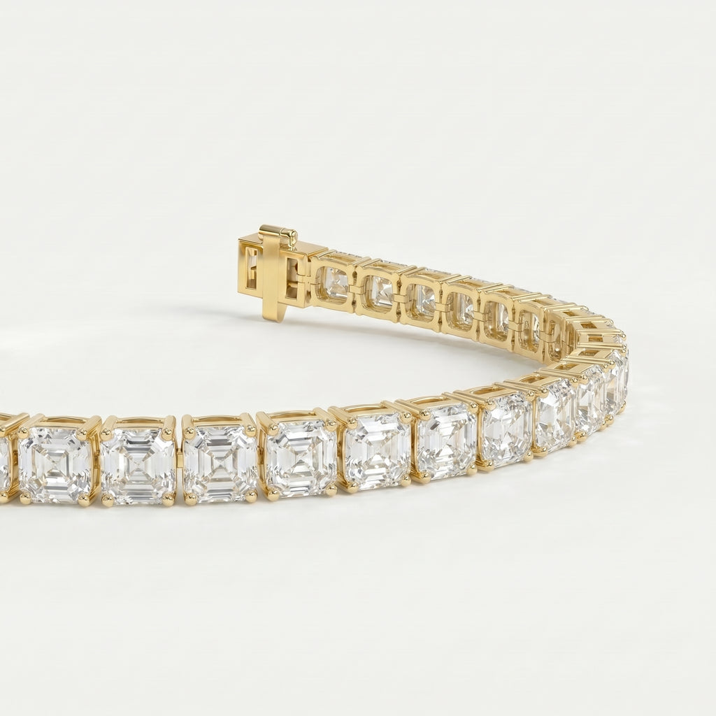 Yellow gold tennis bracelet with asscher cut stones shown at an angled view highlighting brilliance and craftsmanship.