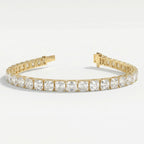 Side profile of yellow gold tennis bracelet displaying secure stone settings and premium jewelry construction.