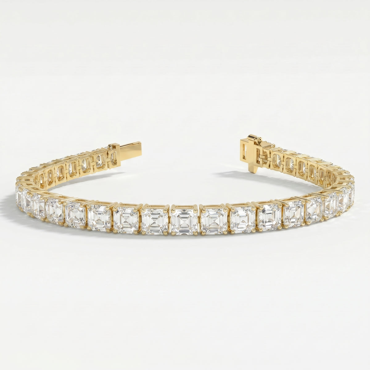 Side profile of yellow gold tennis bracelet displaying secure stone settings and premium jewelry construction.