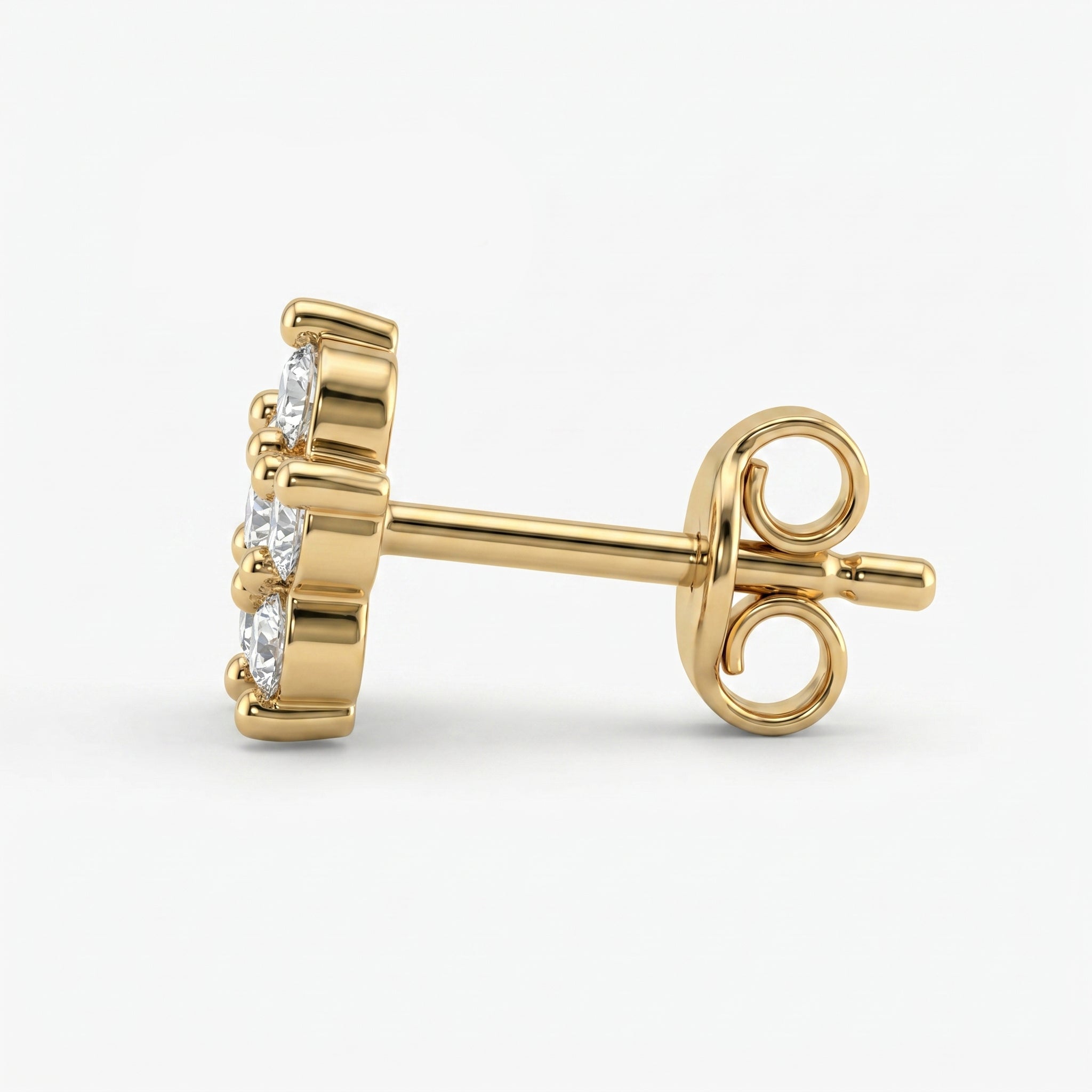 Macro close-up of floral diamond earrings highlighting brilliant sparkle and fine gold detailing