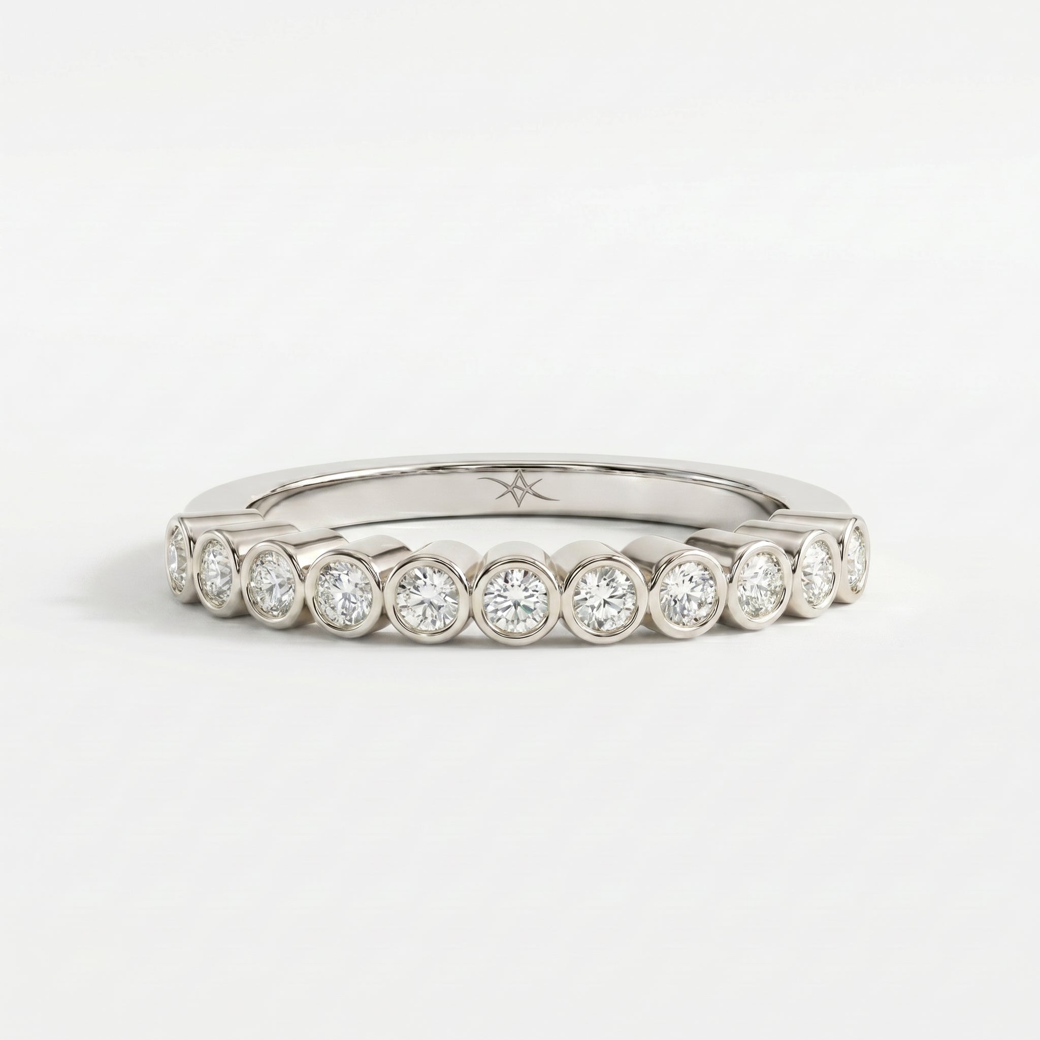 Woman wearing curved diamond wedding band in everyday lifestyle setting showing elegant modern styling