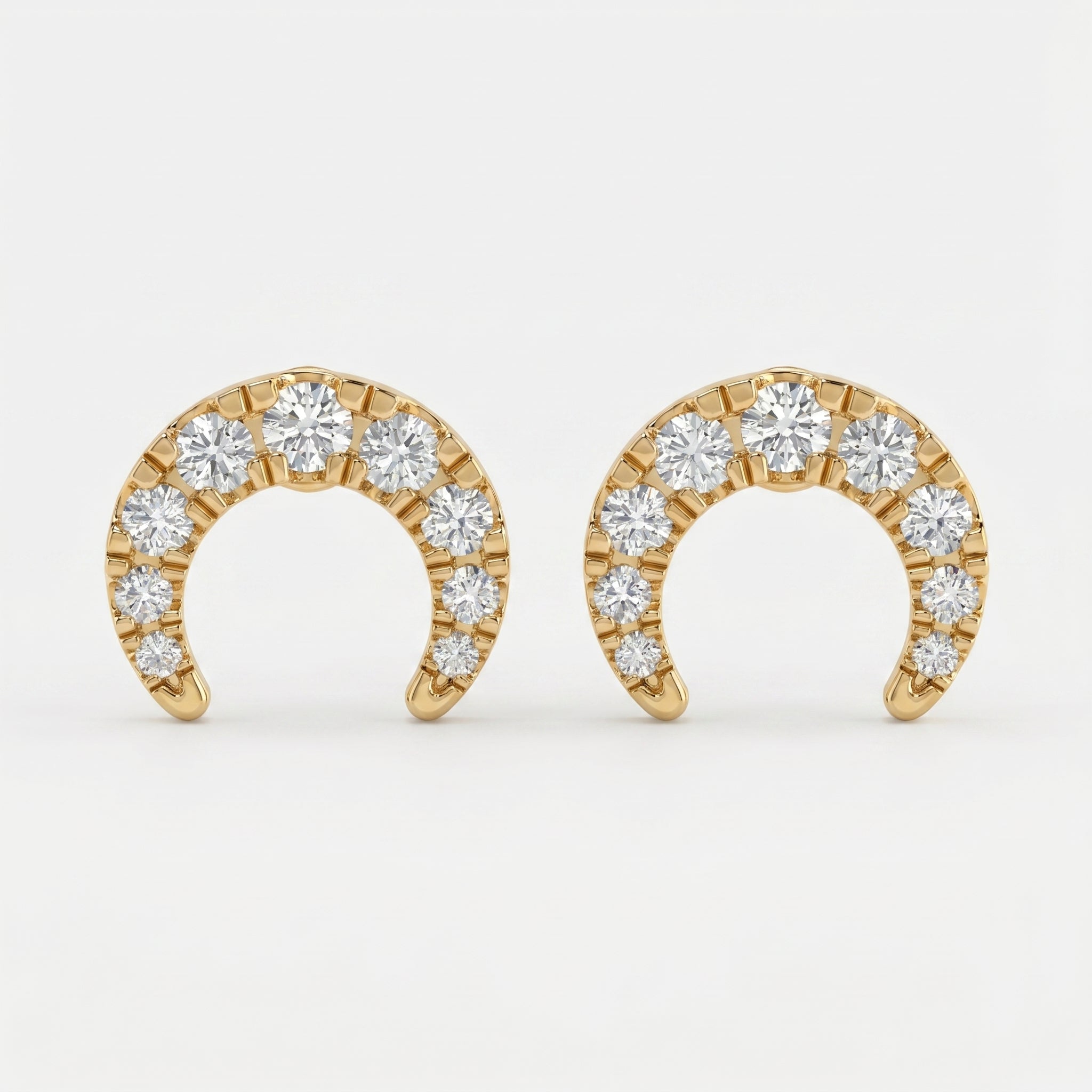  Yellow gold diamond crescent stud earrings with pavé round diamonds on clean white background