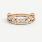 Top view of Rose gold diamond eternity ring featuring marquise and round brilliant stones