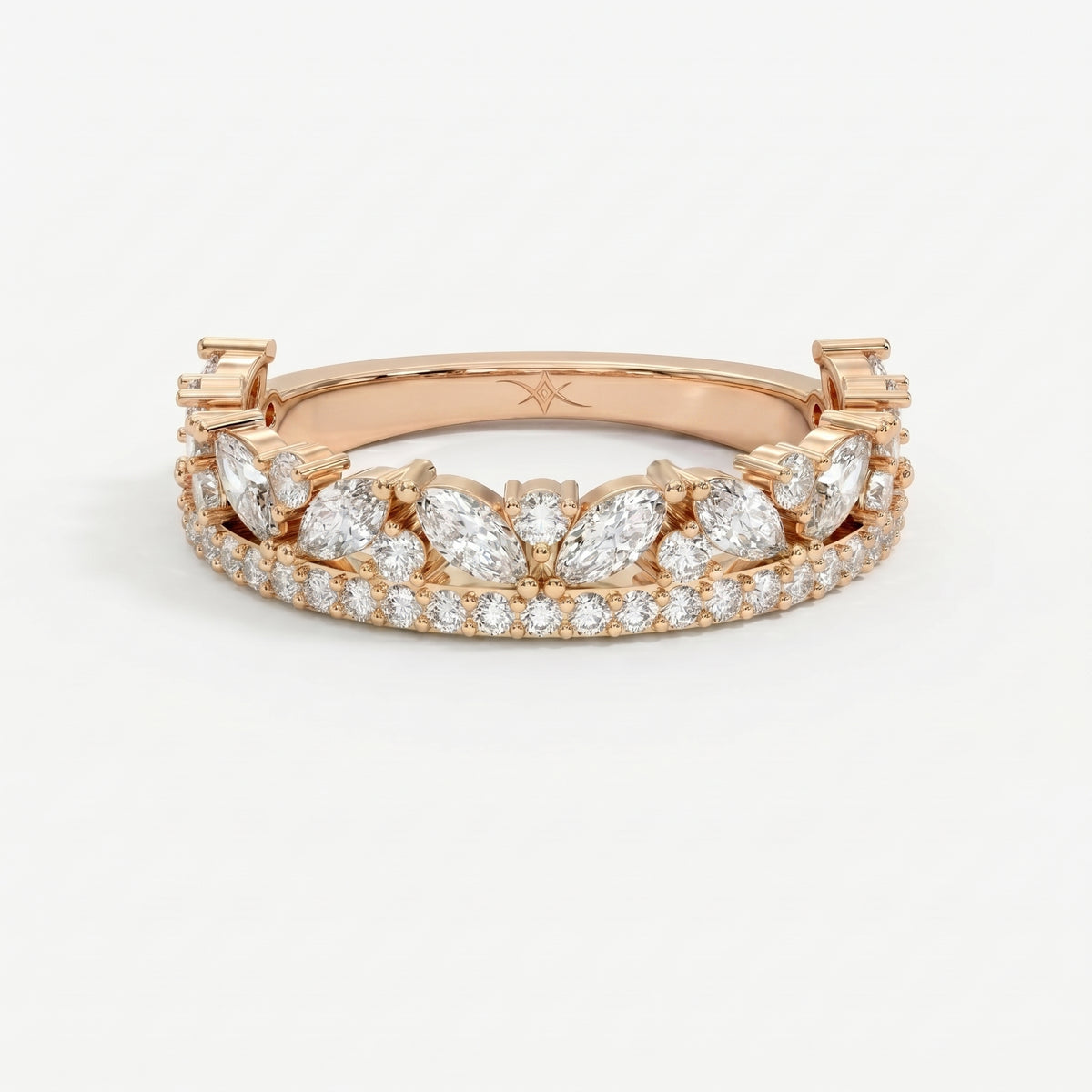 Top view of Rose gold diamond eternity ring featuring marquise and round brilliant stones