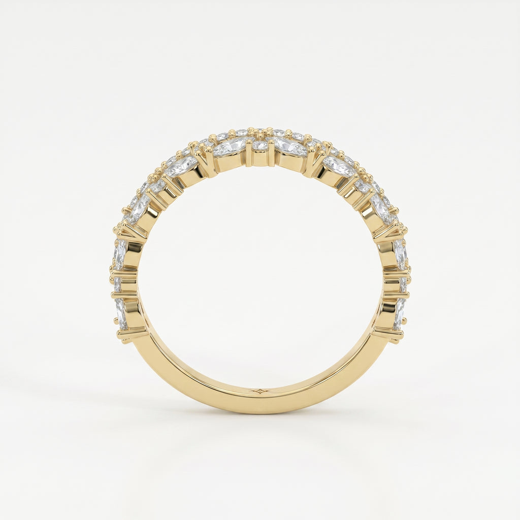 Diamond crown eternity band in yellow gold featuring marquise and round diamonds on a clean white background