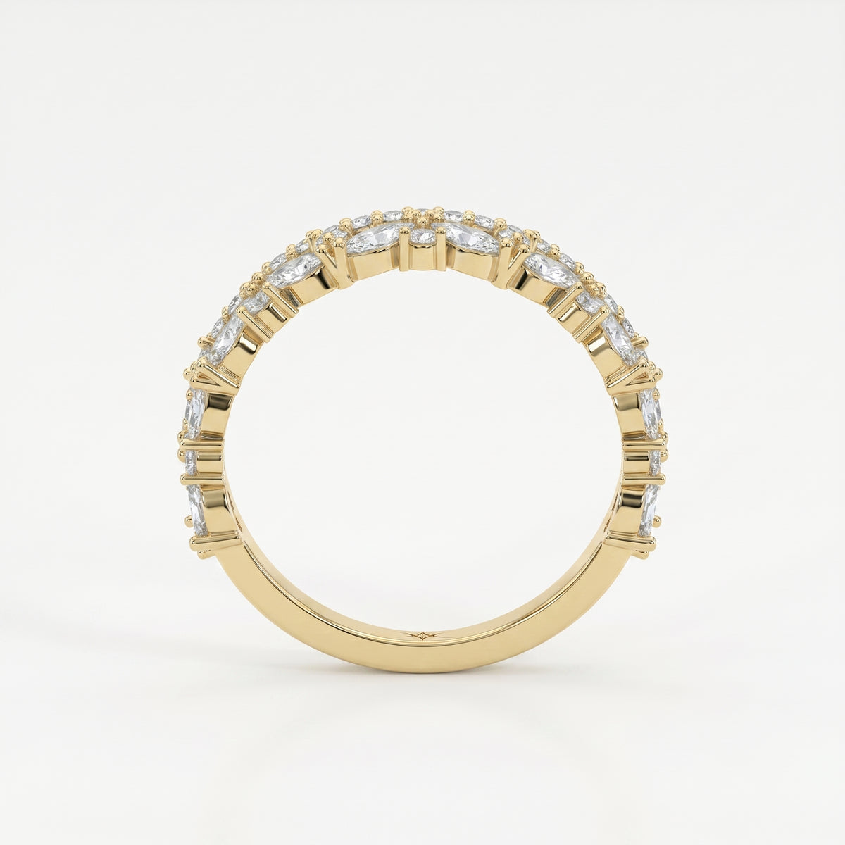 Diamond crown eternity band in yellow gold featuring marquise and round diamonds on a clean white background