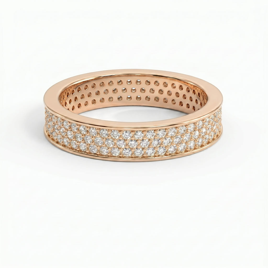 Diamond eternity band at 45-degree angle displaying continuous pavé diamonds and polished precious metal finish.