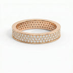 Diamond eternity band at 45-degree angle displaying continuous pavé diamonds and polished precious metal finish.