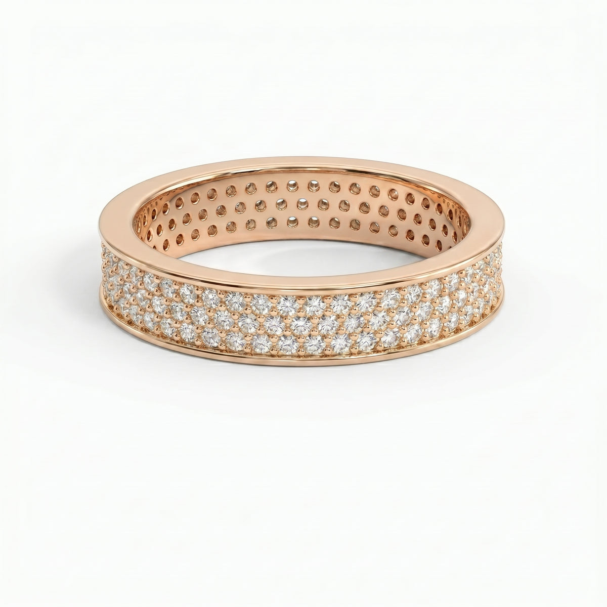 Diamond eternity band at 45-degree angle displaying continuous pavé diamonds and polished precious metal finish.