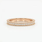 Diamond eternity wedding band styled with engagement ring in a modern bridal jewelry lifestyle scene.