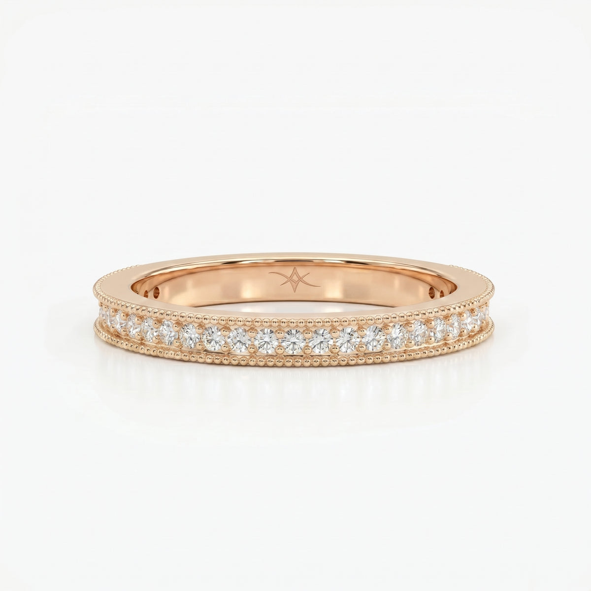 Diamond eternity wedding band styled with engagement ring in a modern bridal jewelry lifestyle scene.
