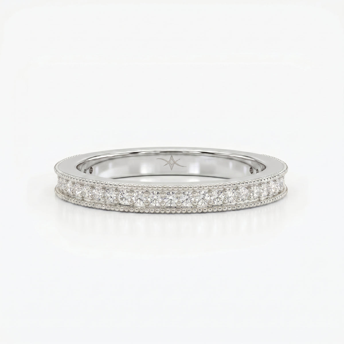Diamond eternity band highlighting brilliant diamonds, milgrain detailing, comfort fit, and fine craftsmanship.