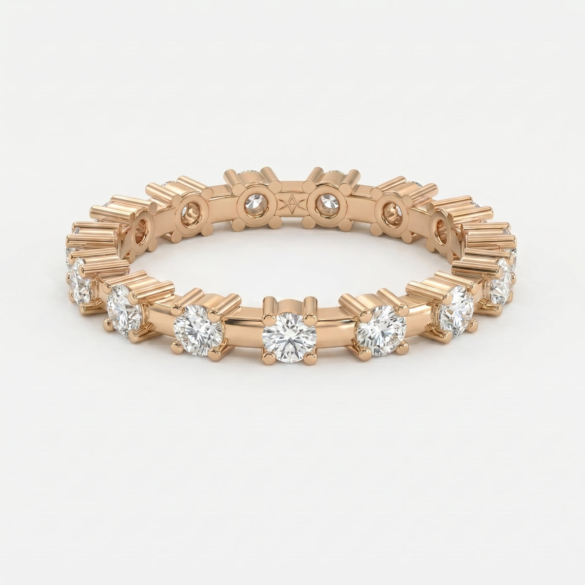 Rose gold eternity ring with round brilliant diamonds shown at 45-degree angle highlighting craftsmanship and sparkle.