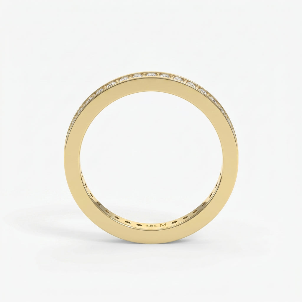 Yellow gold diamond eternity band with channel-set round diamonds, luxury wedding ring with polished finish