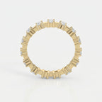 Round diamond eternity band in yellow gold with full-circle diamonds, luxury wedding ring photographed on white background.