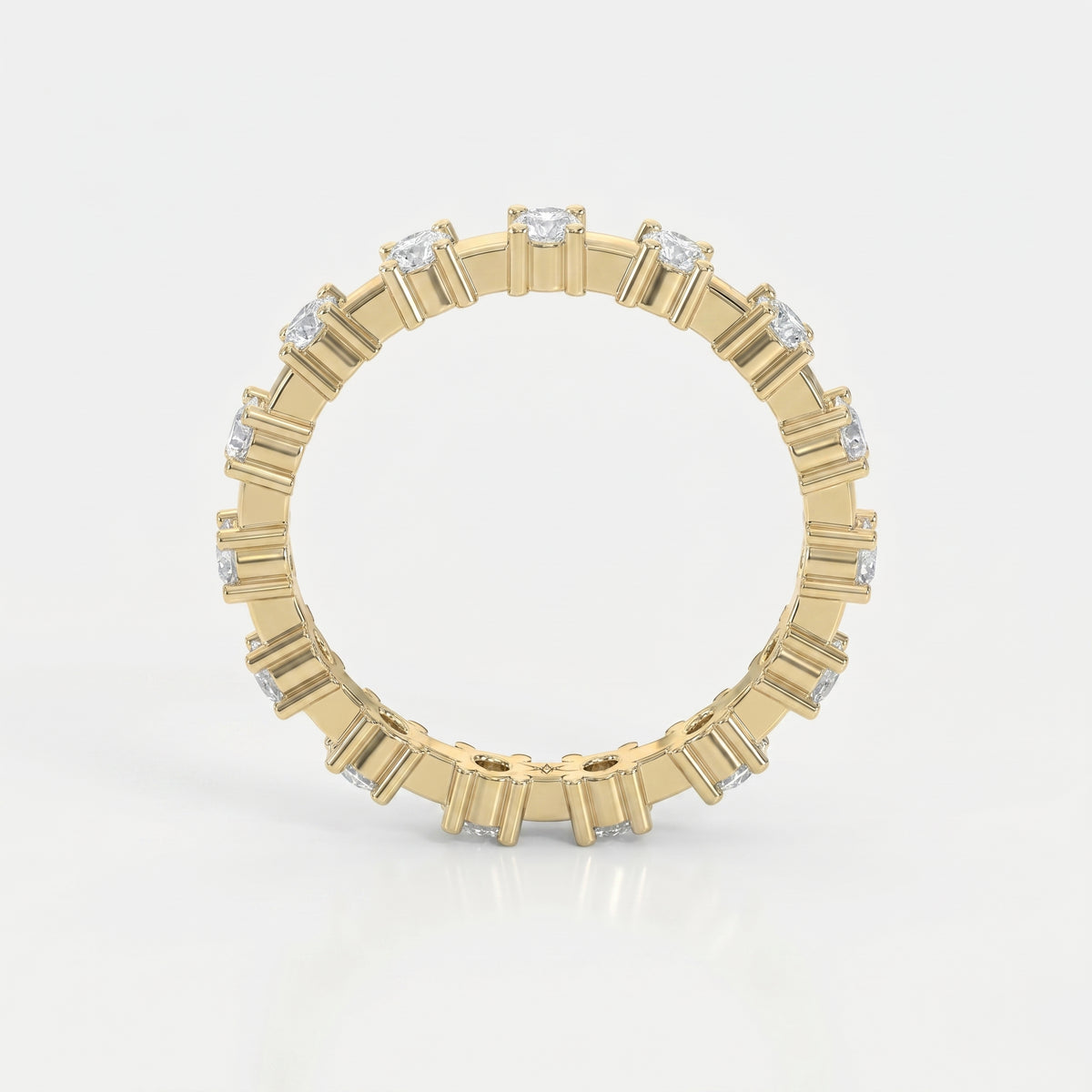 Round diamond eternity band in yellow gold with full-circle diamonds, luxury wedding ring photographed on white background.