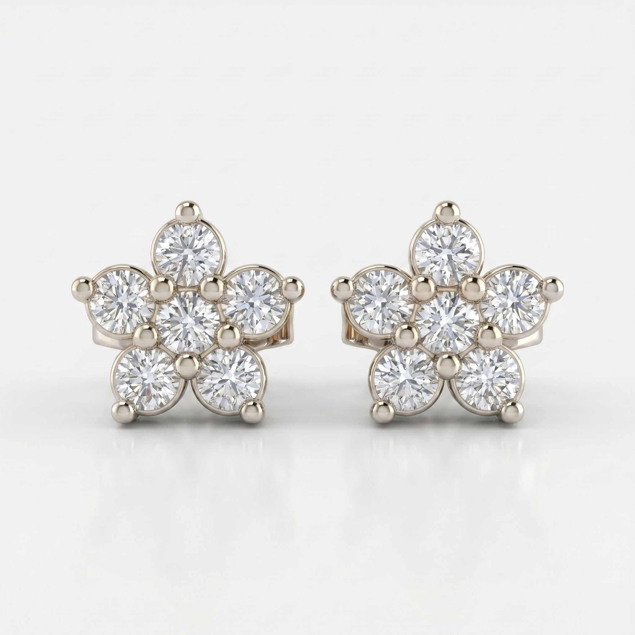 Side profile of floral diamond stud earrings showing rose gold setting craftsmanship and structure