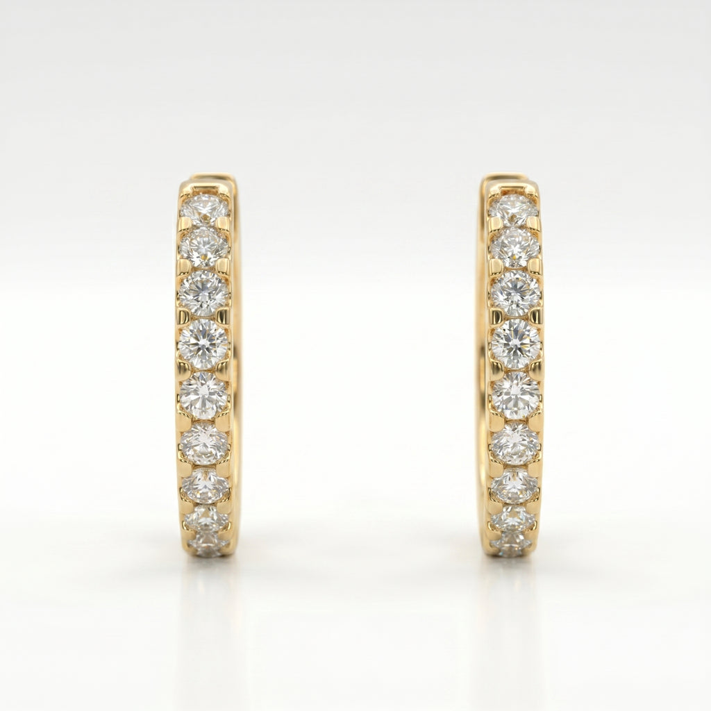 Yellow gold diamond huggie hoop earrings displayed in premium jewelry gift box for luxury gifting presentation
