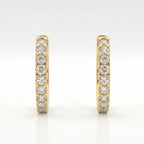 Yellow gold diamond huggie hoop earrings displayed in premium jewelry gift box for luxury gifting presentation