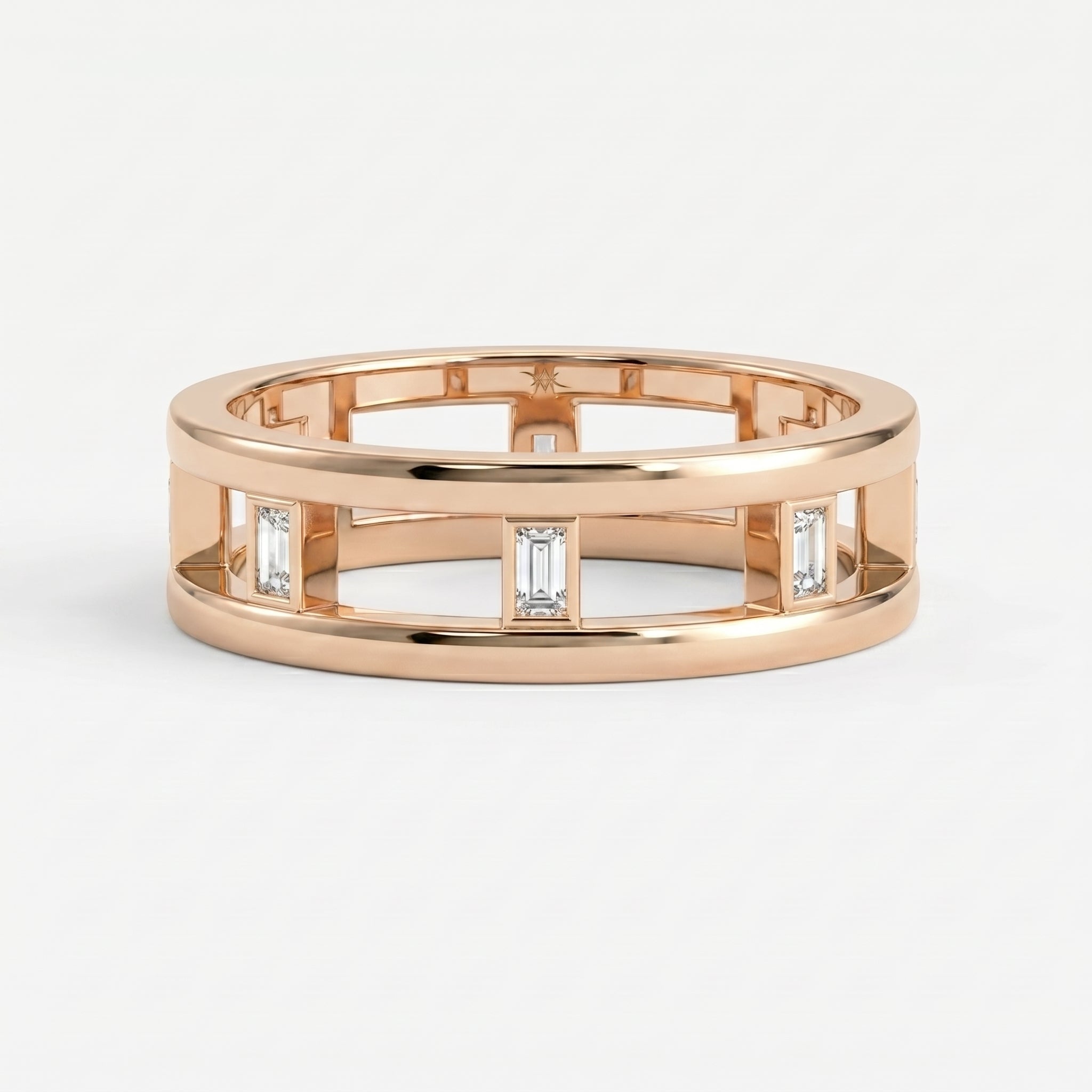 Top view of luxury openwork diamond band ring displaying geometric design and Baguette diamond placement