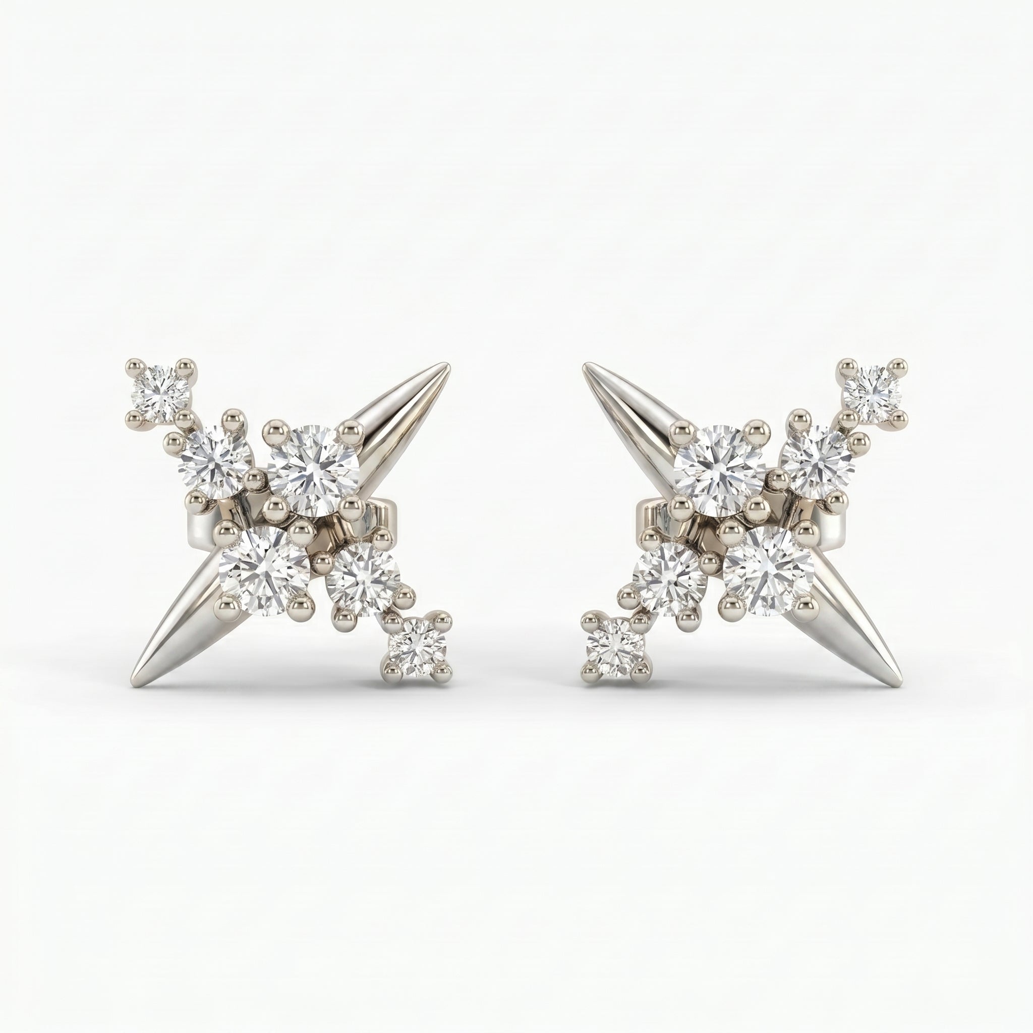 Luxury diamond cluster spike stud earrings in White gold shown at 45-degree angle with brilliant sparkle detail