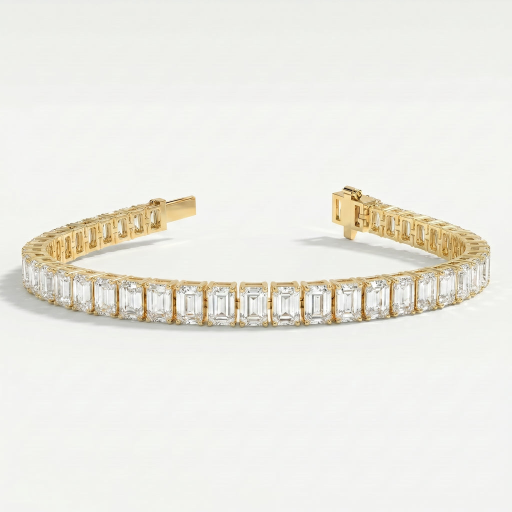 Side profile of emerald cut diamond tennis bracelet displaying yellow gold prong setting and craftsmanship.
