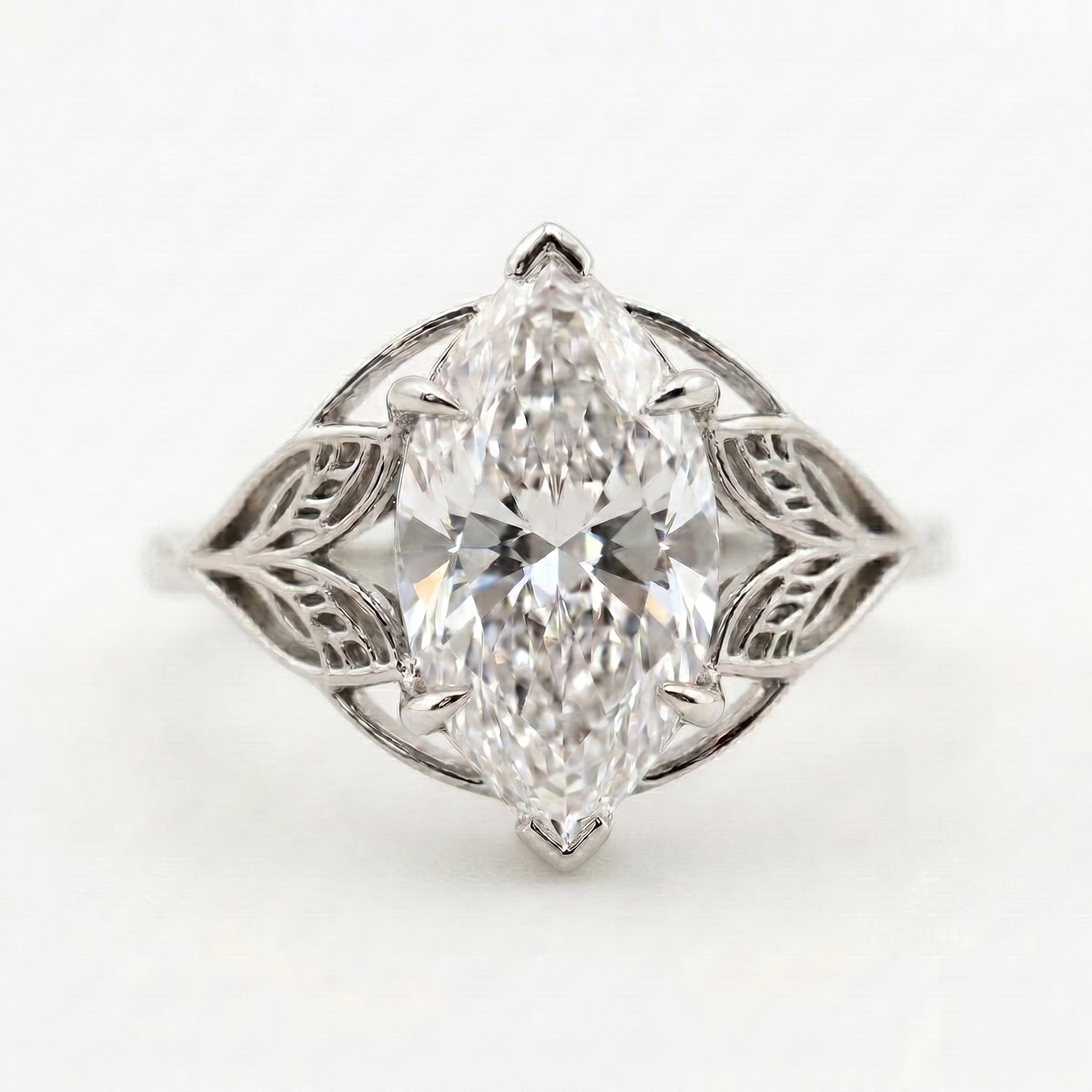 Solitaire Leaf Design Marquise Cut Diamond Engagement Ring