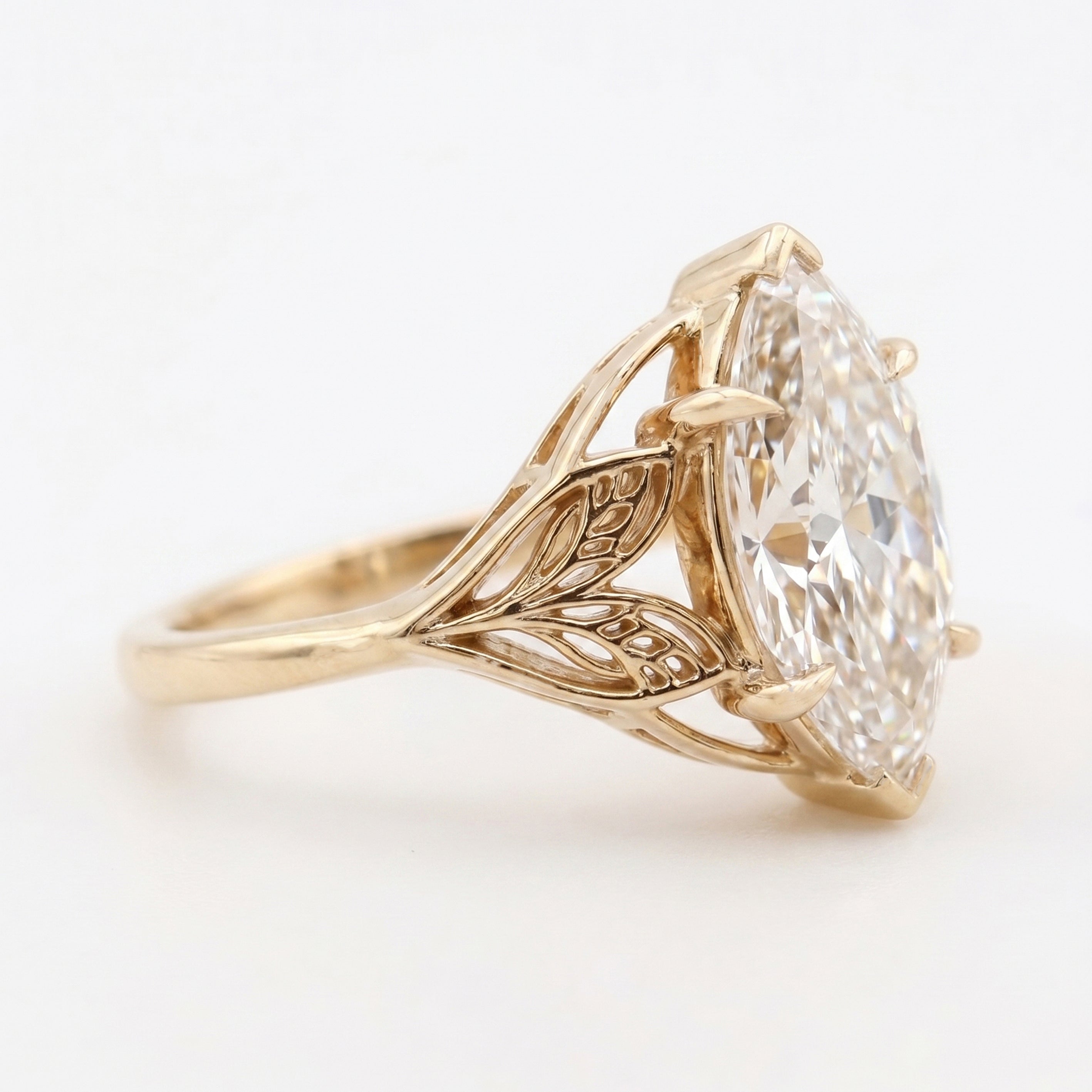 Solitaire Leaf Design Marquise Cut Diamond Engagement Ring