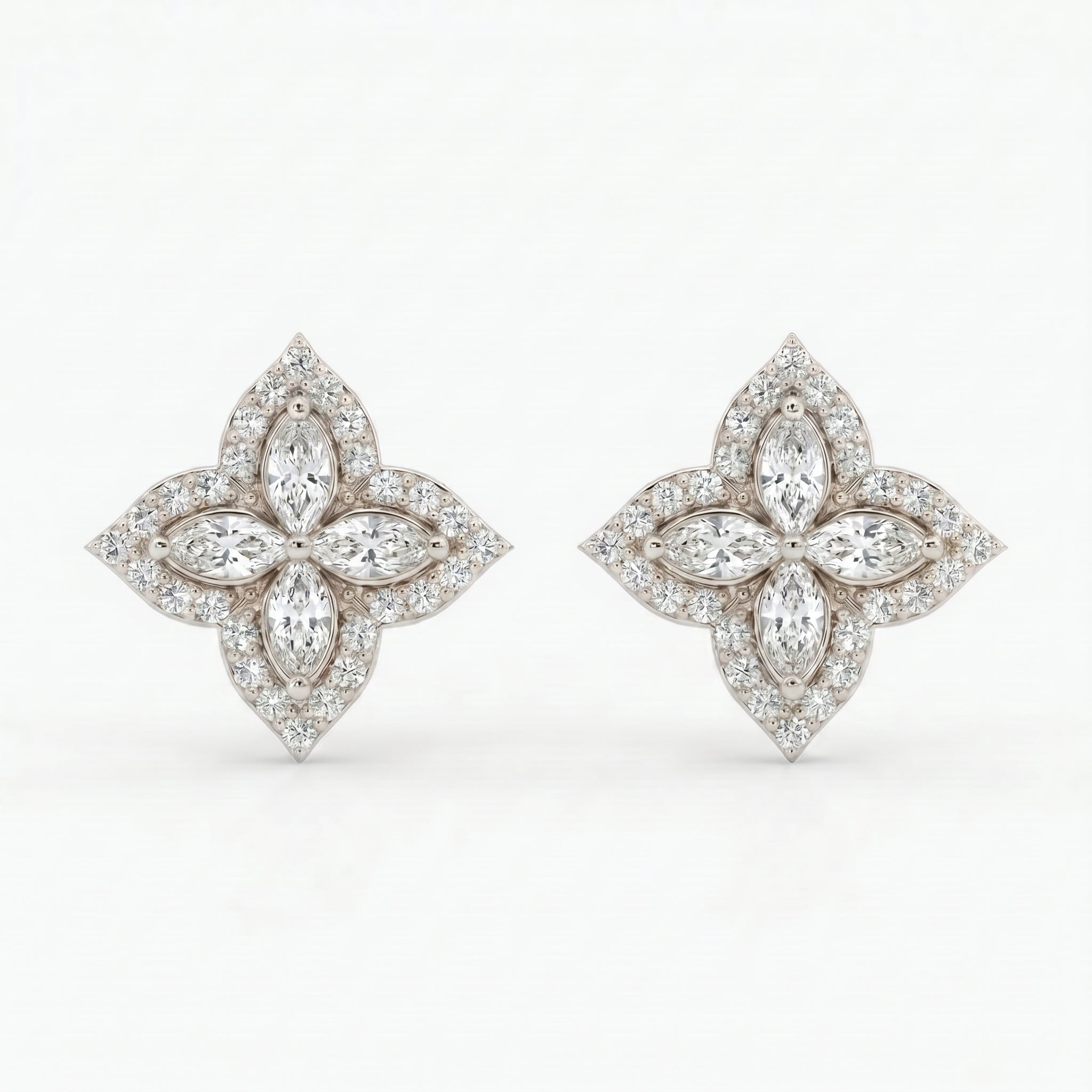 Woman wearing luxury floral diamond stud earrings with elegant everyday styling and premium sparkle