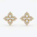 Luxury floral diamond stud earrings in Yellow gold with marquise stones and pavé halo on white background