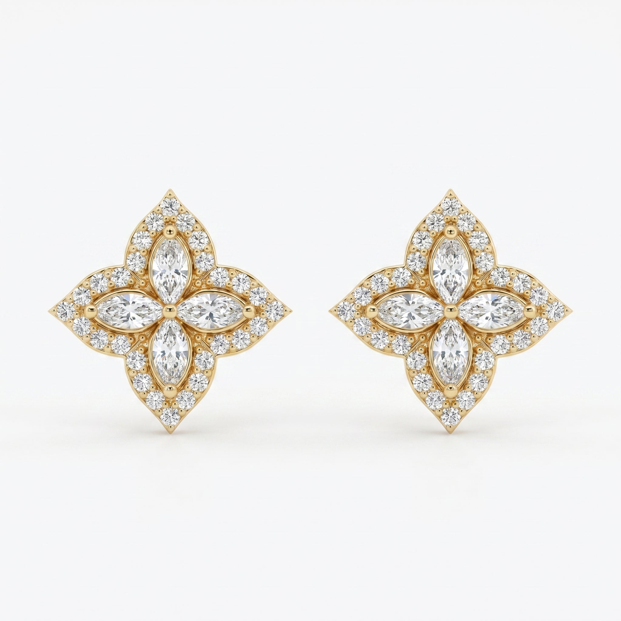 Luxury floral diamond stud earrings in Yellow gold with marquise stones and pavé halo on white background
