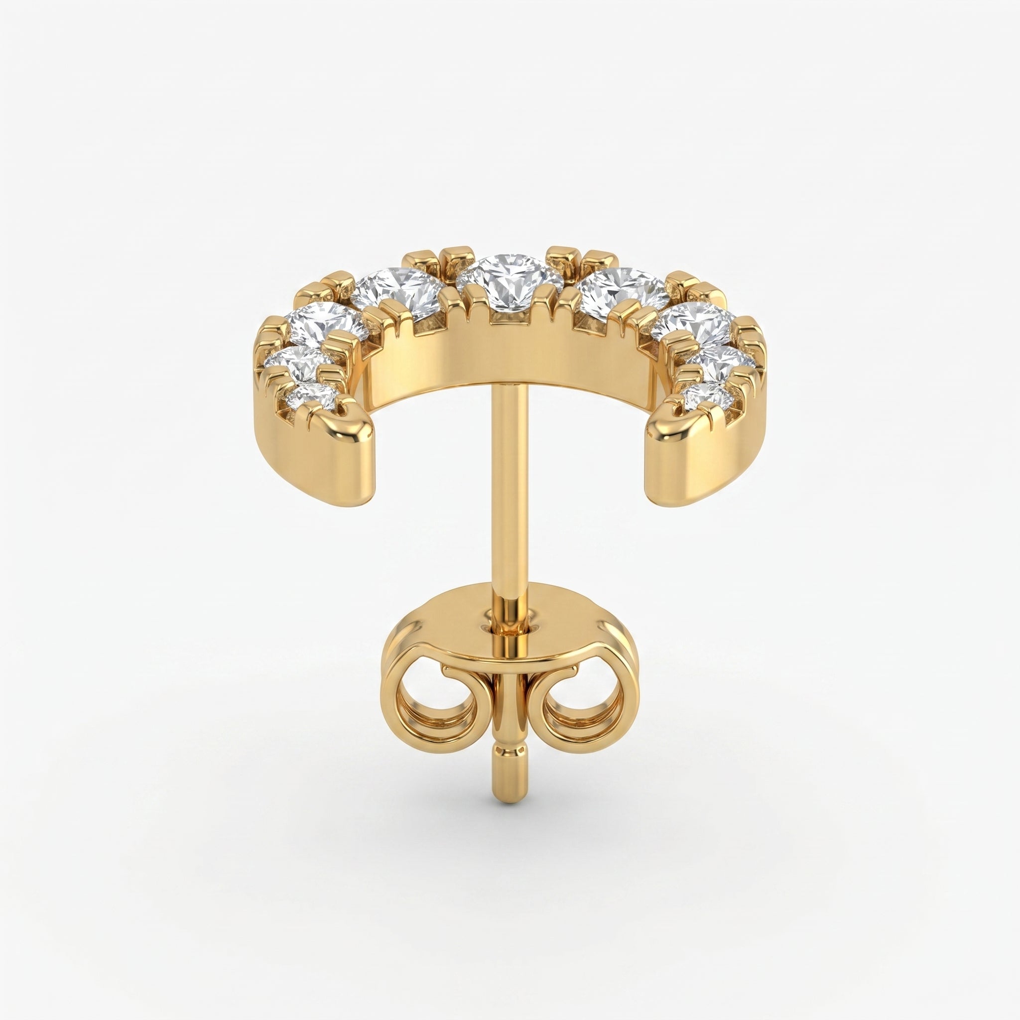 Luxury yellow gold crescent earrings with brilliant pavé diamonds in angled studio product shot